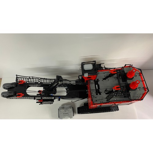 763 - REOBRIX 22014 - RC Control rope excavator 2,968 clamping modules building kit. This set comes built ... 