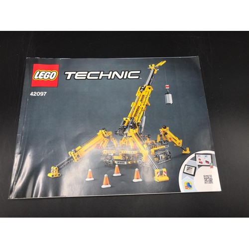 764 - LEGO TECHNIC 42097 Compact Crawler Crane. The Crawler Crane folds into a compact vehicle that travel... 