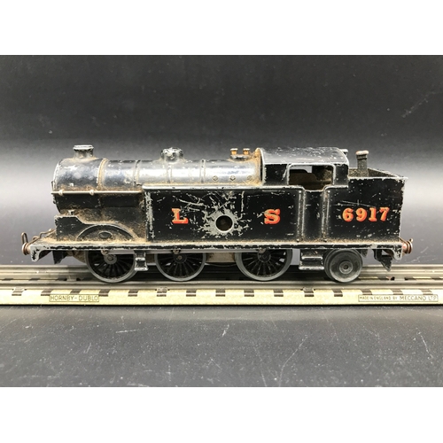 113 - A Rare Pre-war Hornby Dublo OO gauge Clockwork 0-6-2T No. 6917 in LMS black livery, Cogs appear work... 