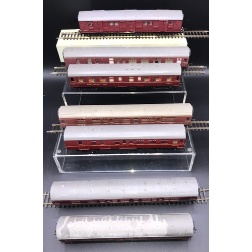 168 - A ‘OO’ gauge Rake of Seven Triang Crimson Coaches, some LMS includes Triang R227 BR Bogie Utility Va... 