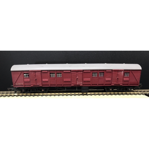 168 - A ‘OO’ gauge Rake of Seven Triang Crimson Coaches, some LMS includes Triang R227 BR Bogie Utility Va... 