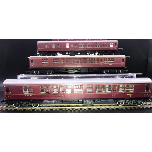 168 - A ‘OO’ gauge Rake of Seven Triang Crimson Coaches, some LMS includes Triang R227 BR Bogie Utility Va... 