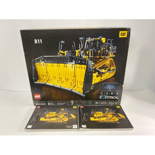 771 - LEGO TECHNIC App-Controlled CAT D11 Bulldozer 42131. ust like the real CAT bulldozer, this RC constr... 