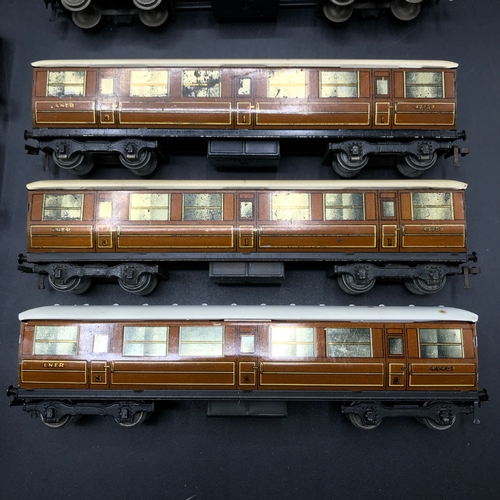 118 - Three Hornby Meccano Tinplate Rakes of 4/3/3 Coaches, along with Two Hornby Dublo Coaches, 'Ready-to... 