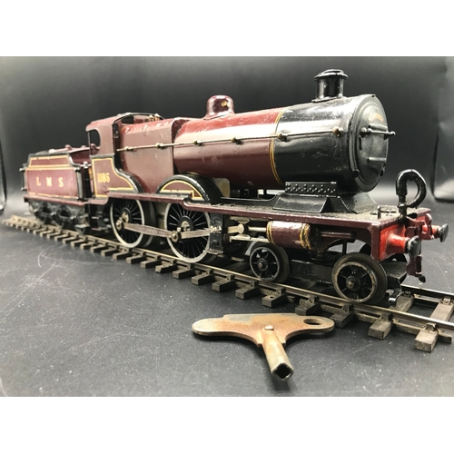 36 - Hornby O Gauge Clockwork LMS 1185 4-4-0 and tender with key - Fair (1) 1000g