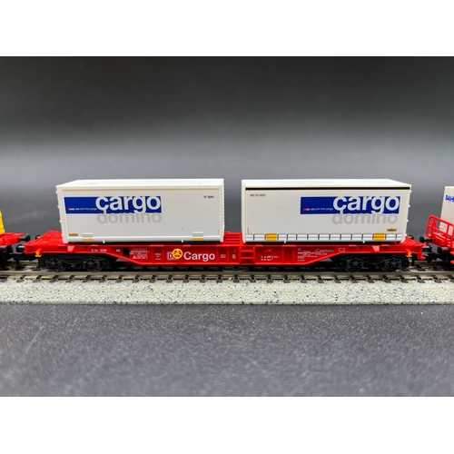 273 - An 'N' Gauge DB Cargo train of six Rolling-stock of various manufacturers with loads shown, two Flei... 