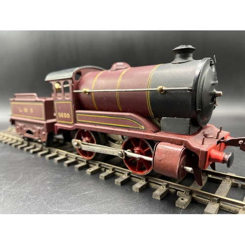 39 - Hornby Meccano Type 501 Clockwork 0-4-0 LMS 5600 locomotive with tender, LMS lined livery, slight pa... 