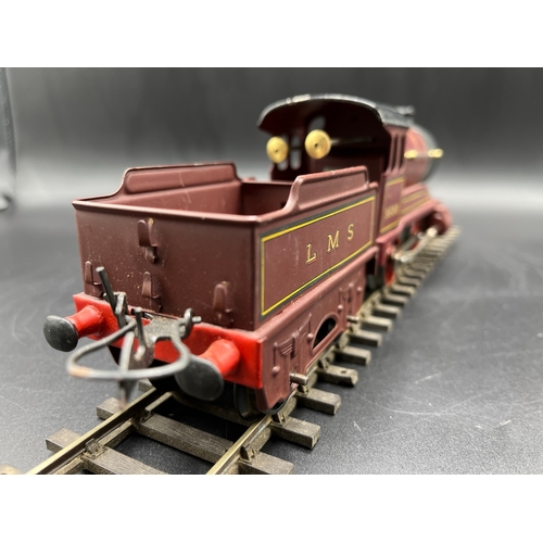 39 - Hornby Meccano Type 501 Clockwork 0-4-0 LMS 5600 locomotive with tender, LMS lined livery, slight pa... 