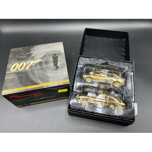 594 - CORGI & BOND 40th Anniversary twin set of gold Aston Martin model cars a DB5 and a V12 Vanquish, V12... 