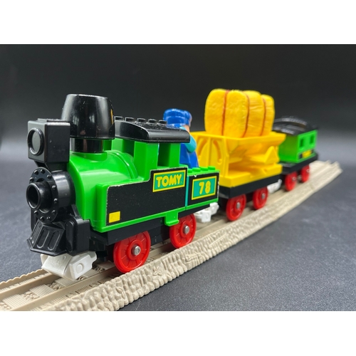 780 - A Gigantic collection of Tomy Thomas and Friends play rail of Trackmaster  Brown, Light blue and Dar... 