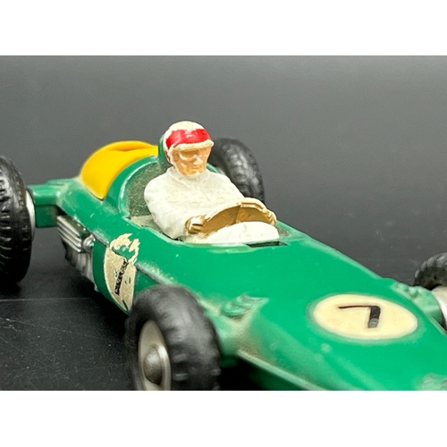 515 - Dinky Toys BRM Racing Car 243, Play worn, missing drivers screen and damage to rear yellow housing -... 