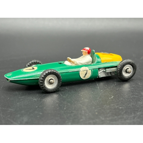 515 - Dinky Toys BRM Racing Car 243, Play worn, missing drivers screen and damage to rear yellow housing -... 