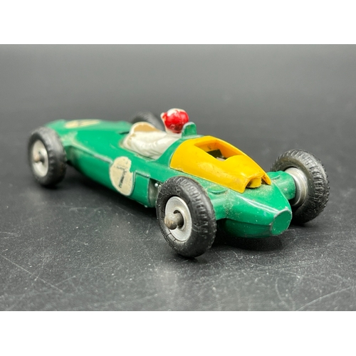 515 - Dinky Toys BRM Racing Car 243, Play worn, missing drivers screen and damage to rear yellow housing -... 