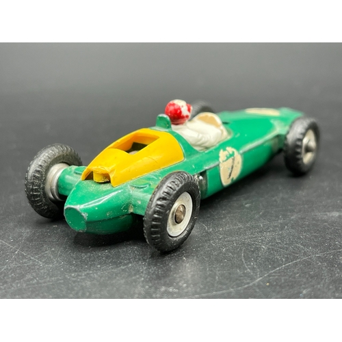 515 - Dinky Toys BRM Racing Car 243, Play worn, missing drivers screen and damage to rear yellow housing -... 