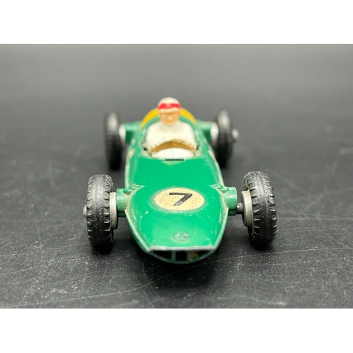 515 - Dinky Toys BRM Racing Car 243, Play worn, missing drivers screen and damage to rear yellow housing -... 