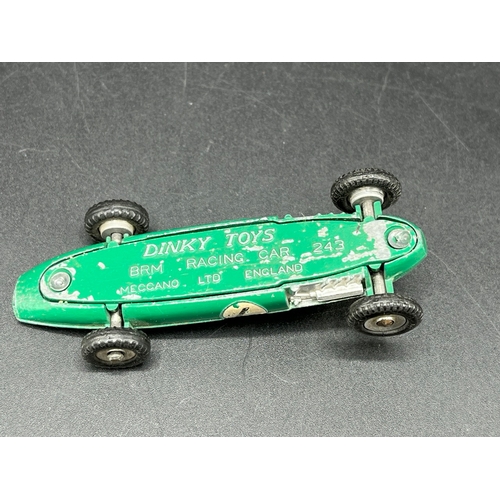 515 - Dinky Toys BRM Racing Car 243, Play worn, missing drivers screen and damage to rear yellow housing -... 