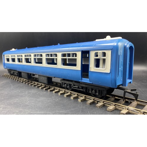 85 - O Gauge Set of Four Triang Novo Big-Big blue coaches in good condition. Boxed. (2). G. 1600g