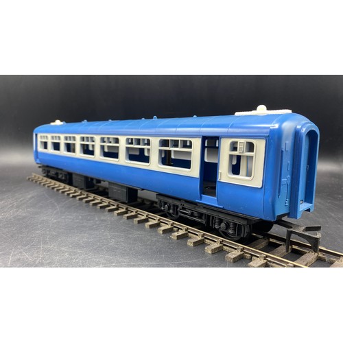 85 - O Gauge Set of Four Triang Novo Big-Big blue coaches in good condition. Boxed. (2). G. 1600g