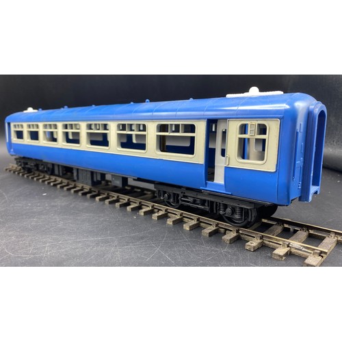 85 - O Gauge Set of Four Triang Novo Big-Big blue coaches in good condition. Boxed. (2). G. 1600g