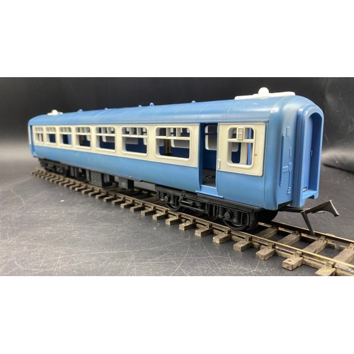 85 - O Gauge Set of Four Triang Novo Big-Big blue coaches in good condition. Boxed. (2). G. 1600g