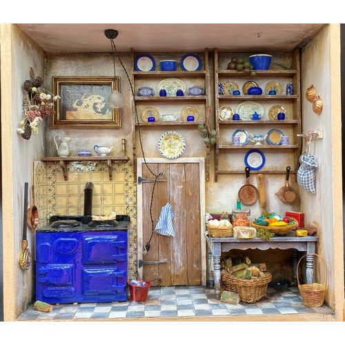 733 - Miniature Detailed Kitchen Shadow Box with lighting. G. 2000g. (1)
A few minor repairs required and ... 