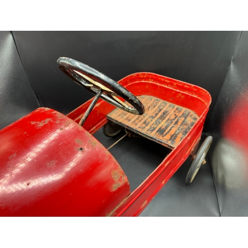 658 - A vintage metal child’s peddle car, to be enjoyed as original or restored, Steering and Peddle actio... 