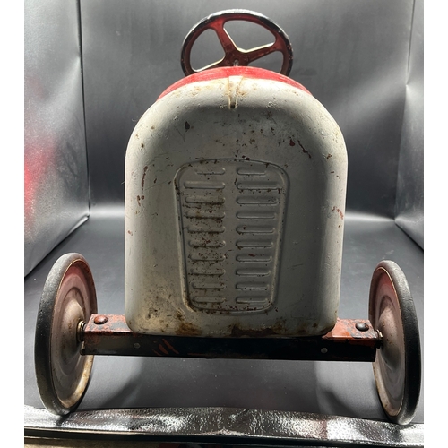 658 - A vintage metal child’s peddle car, to be enjoyed as original or restored, Steering and Peddle actio... 