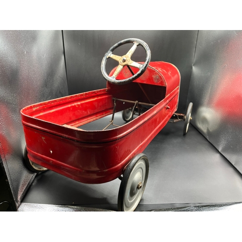 658 - A vintage metal child’s peddle car, to be enjoyed as original or restored, Steering and Peddle actio... 