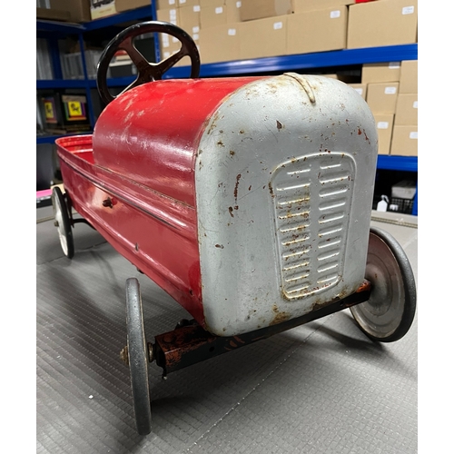 658 - A vintage metal child’s peddle car, to be enjoyed as original or restored, Steering and Peddle actio... 