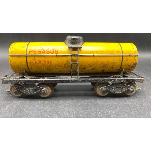 25 - Sakai Japan 'O' gauge Hudson Pacific 'Pegasus Oil Company' 100,000 lbs yellow tank wagon, circa 50/6... 