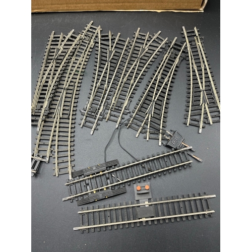 71 - A quantity of Hornby China OO gauge track, including six turn-outs, level crossing, six platform cur... 