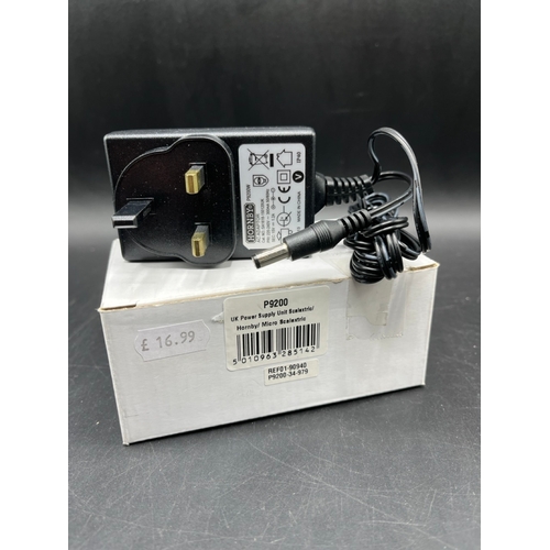 89 - Two ex-shop stock Hornby Power Adaptors, P9300 Digital 15V 4 Amp Transformer together with P9200 UK ... 