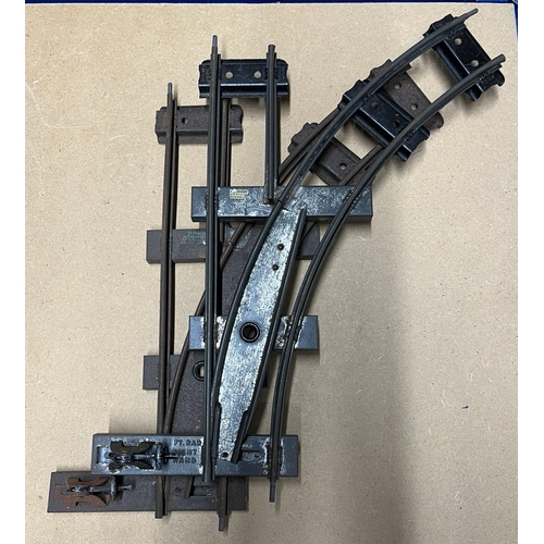 97 - A quantity of ‘O’ gauge track with various turn-outs and cross-overs. Tarnished. - Poor 10000g