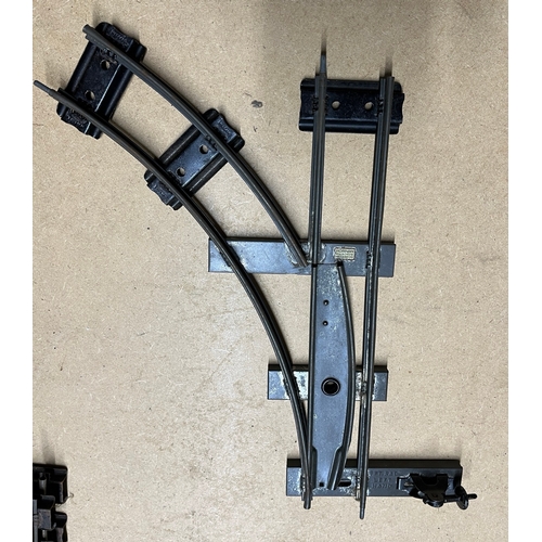 97 - A quantity of ‘O’ gauge track with various turn-outs and cross-overs. Tarnished. - Poor 10000g