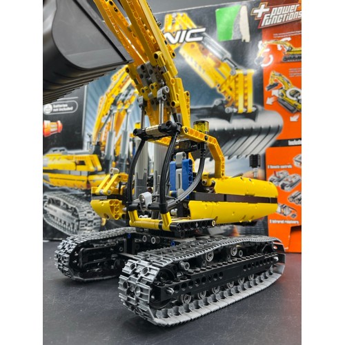 1 - LEGO Technic 8043 Motorised Excavator. LEGO® Power Functions dual infrared remote control to drive t... 