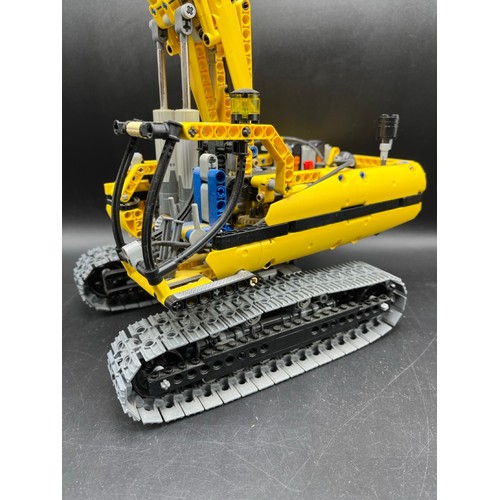 1 - LEGO Technic 8043 Motorised Excavator. LEGO® Power Functions dual infrared remote control to drive t... 