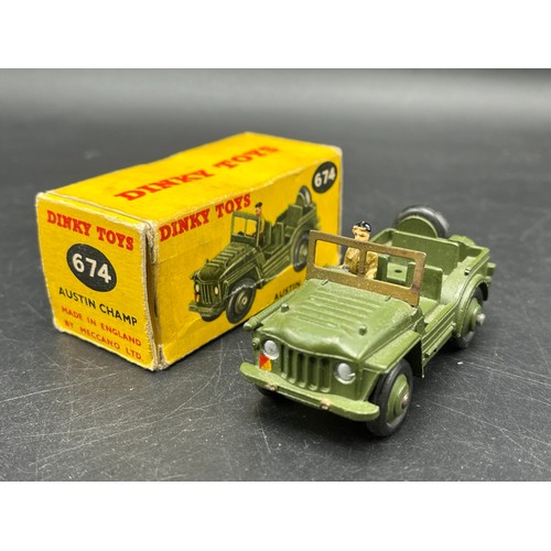 9 - Three Dinky Toys Armoured vehicles
(250g)
Boxed Dinky Toys 674 Austin Champ 
Dinky Toys 673 Scout ca... 