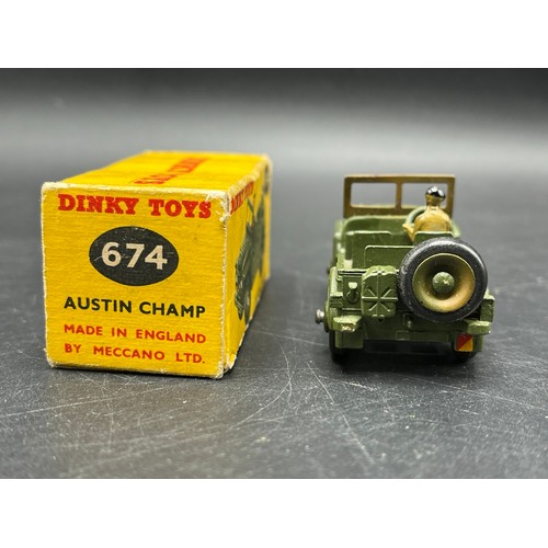 9 - Three Dinky Toys Armoured vehicles
(250g)
Boxed Dinky Toys 674 Austin Champ 
Dinky Toys 673 Scout ca... 