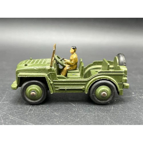 9 - Three Dinky Toys Armoured vehicles
(250g)
Boxed Dinky Toys 674 Austin Champ 
Dinky Toys 673 Scout ca... 