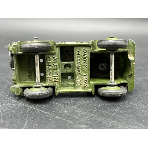 9 - Three Dinky Toys Armoured vehicles
(250g)
Boxed Dinky Toys 674 Austin Champ 
Dinky Toys 673 Scout ca... 