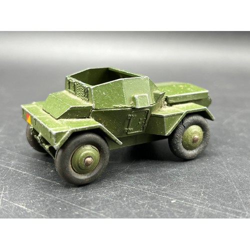 9 - Three Dinky Toys Armoured vehicles
(250g)
Boxed Dinky Toys 674 Austin Champ 
Dinky Toys 673 Scout ca... 