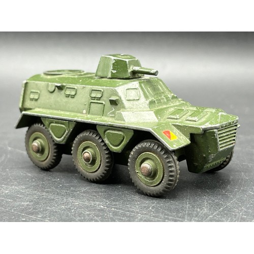 9 - Three Dinky Toys Armoured vehicles
(250g)
Boxed Dinky Toys 674 Austin Champ 
Dinky Toys 673 Scout ca... 