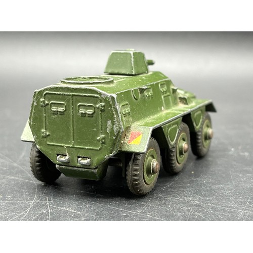 9 - Three Dinky Toys Armoured vehicles
(250g)
Boxed Dinky Toys 674 Austin Champ 
Dinky Toys 673 Scout ca... 