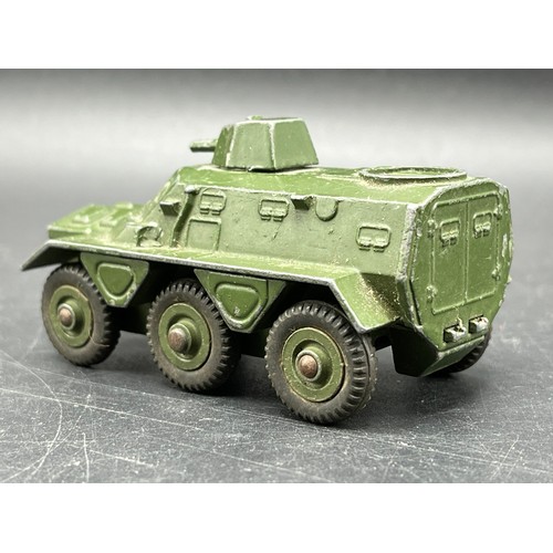 9 - Three Dinky Toys Armoured vehicles
(250g)
Boxed Dinky Toys 674 Austin Champ 
Dinky Toys 673 Scout ca... 