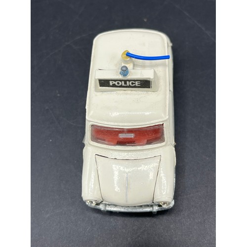 10 - Dinky Toys 250 Police Mini Cooper
(100g)
Red interior
Silver base & radiator grille
Glue fix to chas... 