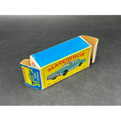 19 - Matchbox Superfast No. 31 Lincoln Continental Boxed
High arches, narrow wheels.
(100g)