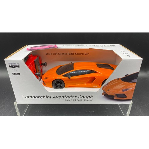 44A - 3 Remote Control Cars - 1 brand new in box. (VG & Poor). (3) 1200g.
Lamborghini Aventdor Coupe Scale... 