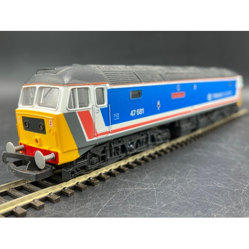 48 - Three Lima Boxed Diesel/Electric Locomotives Tested Runners
(1400g)
Lima 205220 Class 47 'Great East... 