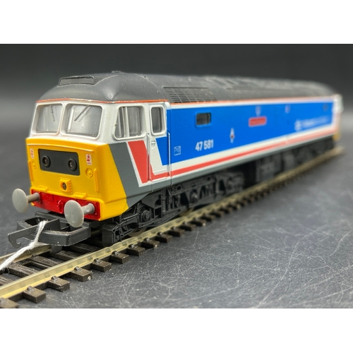 48 - Three Lima Boxed Diesel/Electric Locomotives Tested Runners
(1400g)
Lima 205220 Class 47 'Great East... 