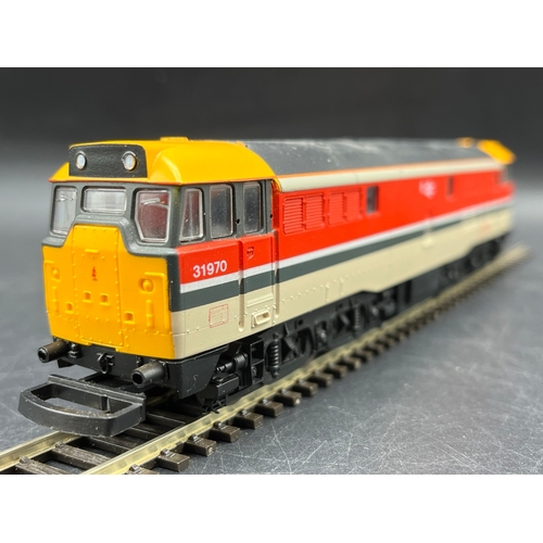 51 - Four Lima Boxed Diesel/Electric Locomotives Tested Runners
(2000g)
Lima L205229 Class 31 BR Research... 